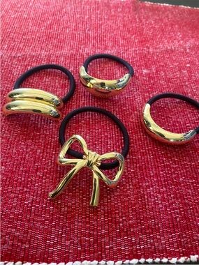 (1MC38)Gold Accent Bow Hair Tie + 3 Matching Gold Accent Hair Rings